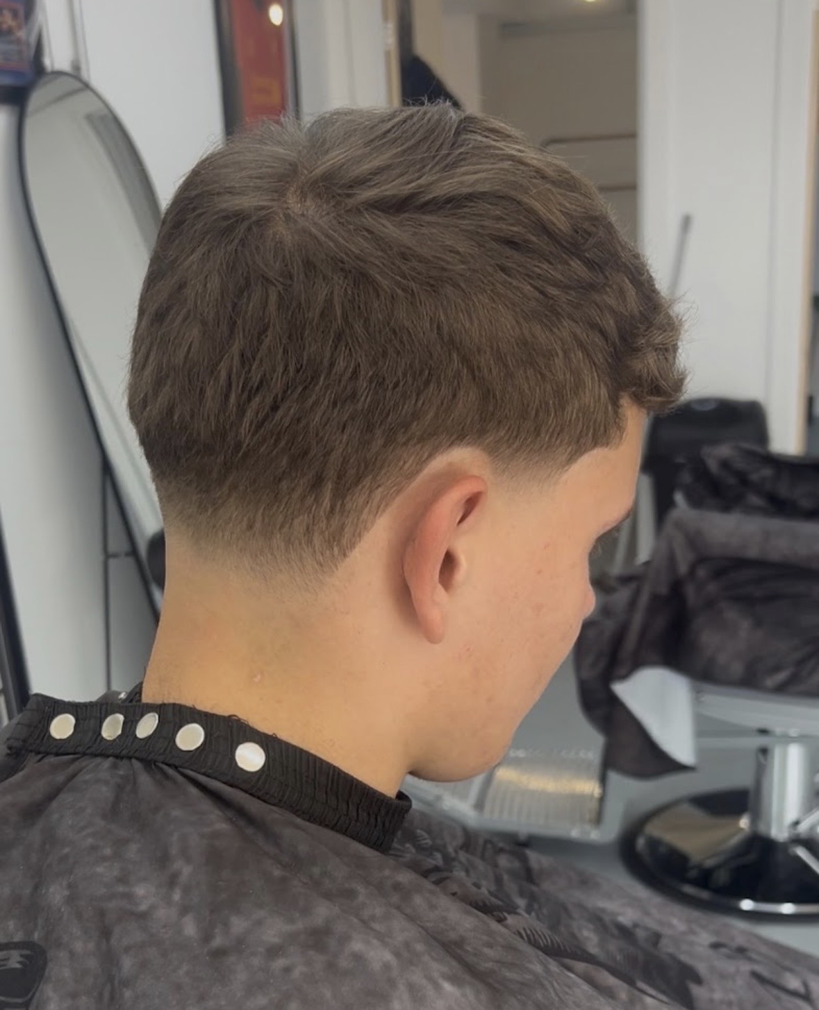 Fresh taper and textured haircut