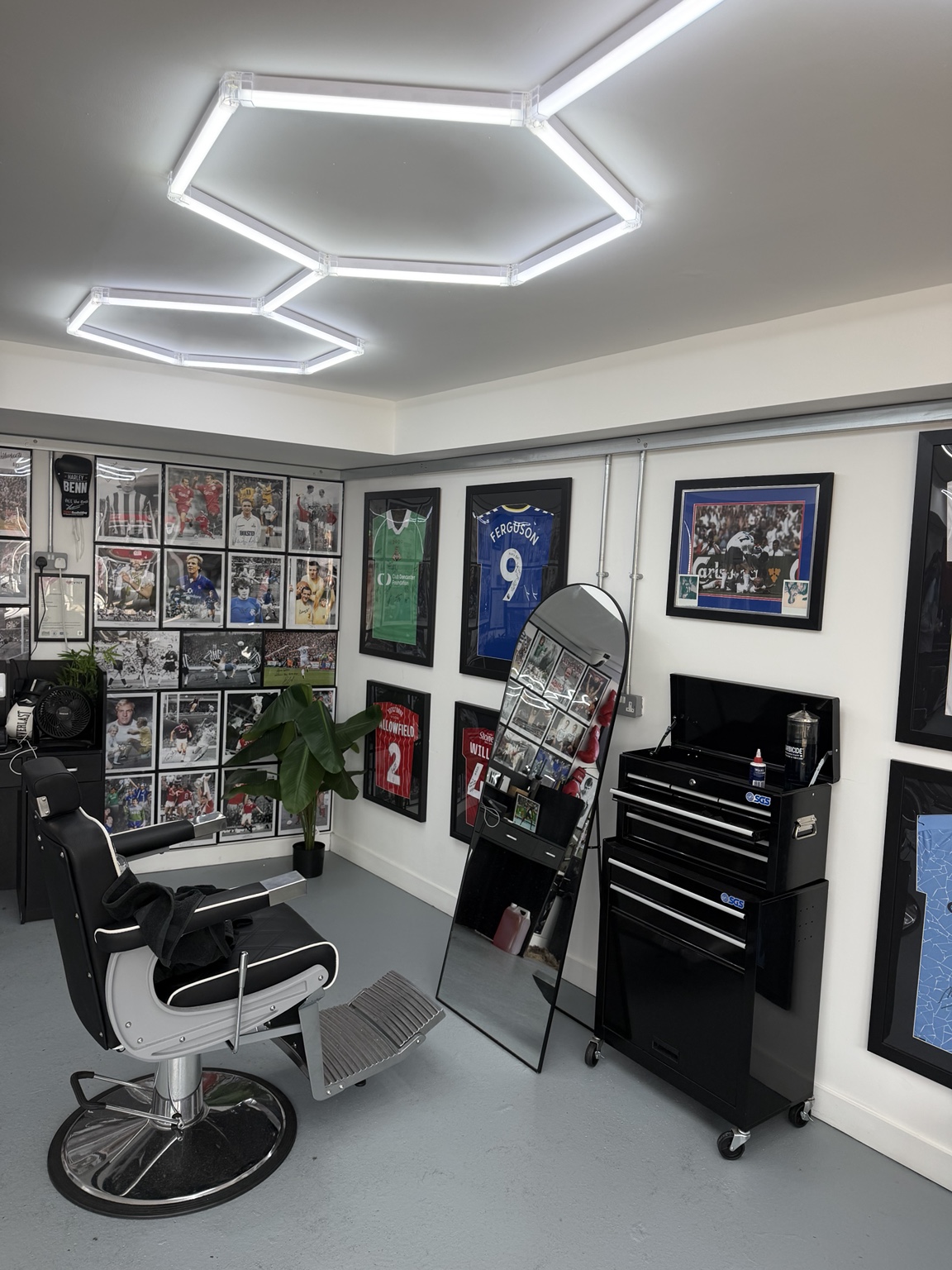 Barber chair beneath North Bay's sports memorabilia